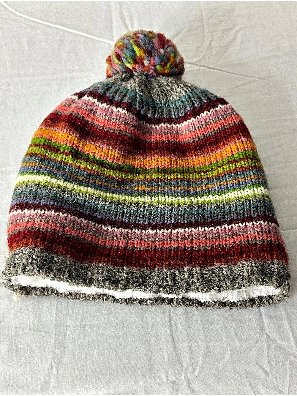 Pachamama Rainbow Stripe Bobble Beanie Hand-Knitted Wool Hat